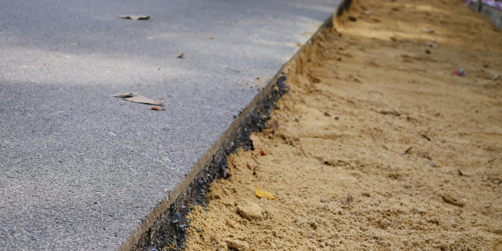 Asphalt or Concrete Layer